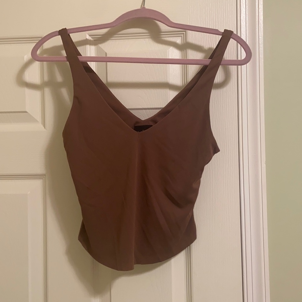 Out from under tank top